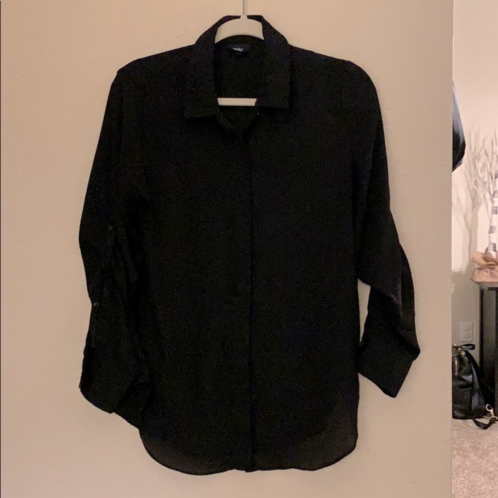 Black button up blouse.